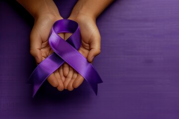 Canvas Print - A person is holding a purple ribbon in their hands