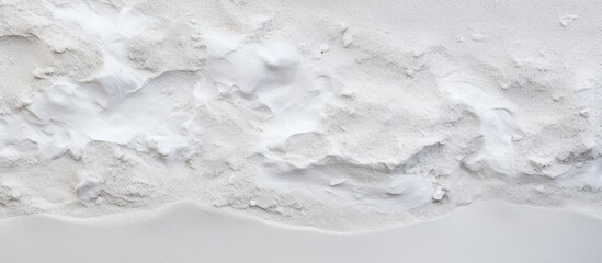 Wall Mural - a close up of a cumulus cloud on a snowy surface, creating a serene and peaceful event in the sky. t
