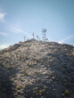 Cell tower on top of rugged desert hill near Las Vegas Nevada