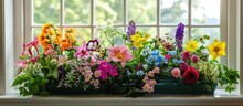 Display Of Vibrant Garden Flowers In A Window Planter
