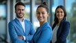 a promotional image of a Sydney real estate agent team with an agent and two associates, blue suits, corporate office, shallow focus 