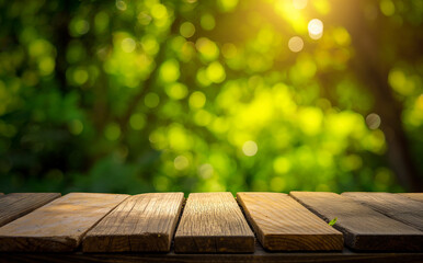 Wall Mural - empty wooden table top with blurred green spring nature background