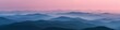 A birds eye view of a majestic mountain range under blushing pink skies at dawn, background, wallpaper, banner, copy space