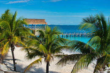 Wall Mural - CANCUN, MEXIICO - December 06.2021: Playa Tortugas - turtle beach at Cancun with beautiful turquoise Ocean. This was on a hot sunny morning during the Covid 19 Pandemic.