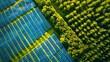 A breathtaking aerial view of a solar farm, with rows of photovoltaic panels harnessing the power of the sun to generate clean, renewable energy.