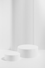 Wall Mural - Two white round podiums with striped column as geometric decor, mockup on white background. Template for presentation cosmetic products, gifts, goods, advertising in contemporary black friday style.