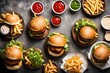 three turkey burger sliders with fries shot from over head in flat lay composition 