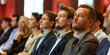 © kimly - A team of professionals attending a business conference.