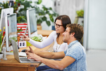 Poster - Collaboration, man and woman with laptop, creative and monitor on desk, technology and internet. Employees, staff and colleagues with smile for project, happiness and teamwork for design and company