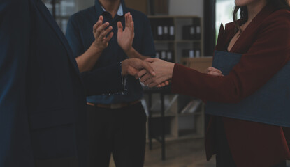 Wall Mural - Business handshake for teamwork of business merger and acquisition,successful negotiate,hand shake,two businessman shake hand with partner to celebration partnership and business deal concept