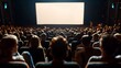 © Maksym - Audience enjoying a movie in a cinema with a bright screen and comfortable seating arrangements