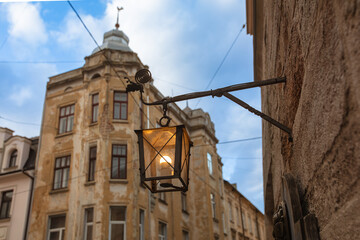 Wall Mural - Closeup of lantern on Market square in Lviv