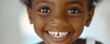 Close up shot of African American baby teeth on white background