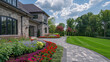 © AI_images - Luxury landscape of wide beautiful garden design with green manicured lawn, beautiful flower beds and path