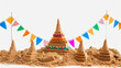 Pagoda made from sand , rows of a colorful small triangular flags and flower decorated ,Thai Buddhist Style on a white background, Songkran Festival Thailand