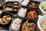 Fototapeta Paryż - Korean food, kimchi, stew, lunch box, stir-fried pork, pork, bulgogi, side dishes, tofu, pork belly, lettuce, ribs, cold noodles, quail eggs, perilla leaves, rice, garlic, cucumber
