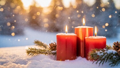 Wall Mural - red christmas candles with snow background