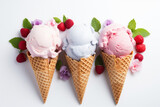 Fototapeta Mapy - Variety of ice cream scoops fruit flavors in waffle cones against pure white background overhead view