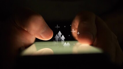 Poster - Hands use a smartphone in the dark against the background of which arrows with percentages move and plus signs appear. Cg footage