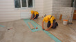 © DenisProduction.com - Brigade of workers laying laminate. Laying laminate.