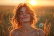 © yevgeniya131988 - Backlit portrait captures serene woman, eyes closed, savoring a blissful, tranquil moment in sunset-lit fields