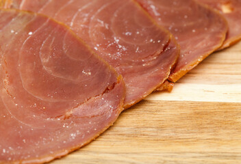 Wall Mural - thin slices of Smoked tuna macro food background