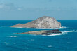 Mānana Island /  Rabbit Island ( Tuff cones ) with Kāohikaipu / Black Rock ( Kaoihikaipu Lava flows. Vent deposits / Coarse near-vent ), Makapuʻu Point, Oahu Hawaii.   Honolulu Volcanic Series. 
