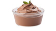 A cup of chocolate pudding with a vibrant green leaf resting delicately on top