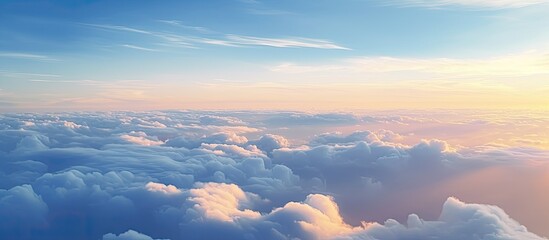 Wall Mural - the sunlight is breaking through the cumulus clouds in the sky, creating a beautiful afterglow on th
