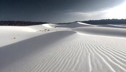 a sand dune with a lone figure in the middle