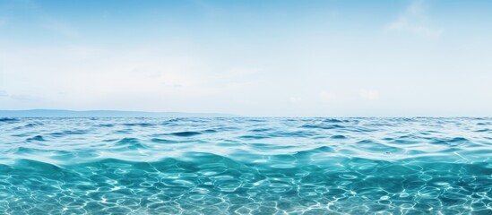Wall Mural - a close up of wind waves on the water with a blue sky and fluffy clouds in the background, creating 