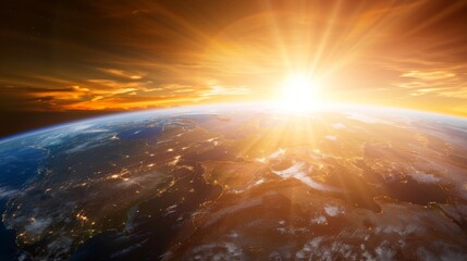 Wall Mural -  The sun brightly rises above Earth's horizon