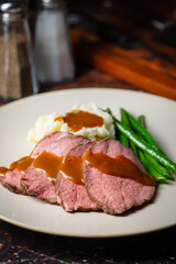 Wall Mural -  pouring brown gravy sauce on roasted beef