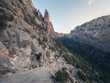 Adventurous Hiker on a Rugged Mountain Trail