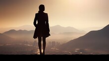 Silhouette Of Business Woman Look Somewhere On The Mountain
