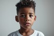 Portrait of cute african american little boy looking at camera