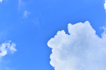 Wall Mural - big cloud in clear blue sky background