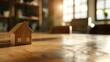House model is displayed on wooden meeting table with in the blurred ,House symbol on a brown wooden background,,Wooden House Model.Home,Housing and Real Estate concept
