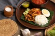 traditional nasi lemak meal assortment closeup
