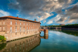 Fototapeta Panele - Toulouse is the capital of the Occitania region in southern France. It is divided by the Garonne River and is located near the border with Spain. It is known as La Ville Rose