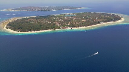 Wall Mural - Aerial view of small tropical islands surrounded by coral reef (Gili Islands)