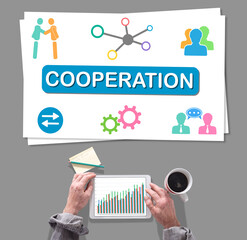 Poster - Cooperation concept placed on a desk