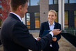 © Svitlana - Smiling man showing contract to happy adult woman