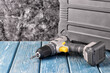 Electric Cordless Brushless Screwdriver for Construction Work on Wooden Table
