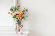 © Cavan Images - Colourful Pastel Floral Bouquet Arrangement in a Clear Vase