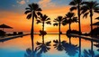 Colorful sunset with palm trees in silhouette and reflections in a resort pool