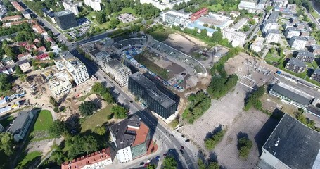 Sticker - Vilnius City Cityscape, Lithuania. Snipiskes Zirmunai District, Business Town in Background. Drone Point of View. Abandoned Zalgiris Stadium