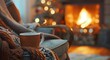 Merry christmas near cozy fireplace, with mug of hot drink, candle, wool thing , cones, book, over old brown desk ,in country house,toned image.
