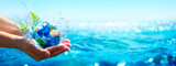 Fototapeta Kuchnia - Ocean Environment Concept - Hands Holding Globe Glass In Blue Sea With Defocused Lights - Contain 3d Rendering - elements of this images furnished by NASA - Visible Earth