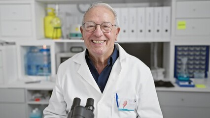 Canvas Print - Mature man radiating confidence, a smiling senior scientist enjoys work at the lab